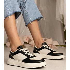 Baskets pour femmes noires avec un accessoire scintillant le noir 1