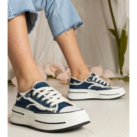 Baskets des femmes bleues sur une semelle haute 1