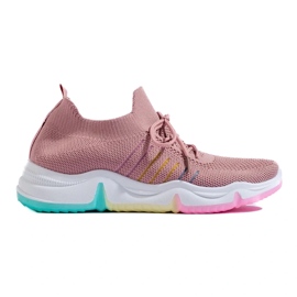 Chaussures de sport sur une plateforme colorée rose 1