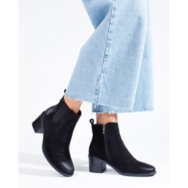 Bottines Chelsea noires pour femme sur le poteau 2