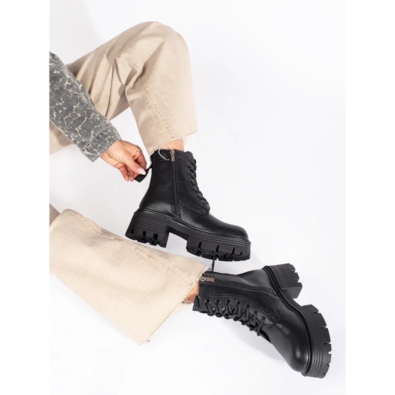 Boots noires en cuir à semelle épaisse le noir 1