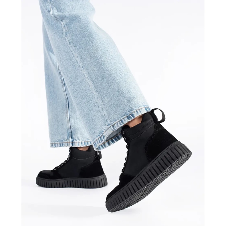 Bottines noires en cuir naturel avec semelle épaisse en relief le noir 1