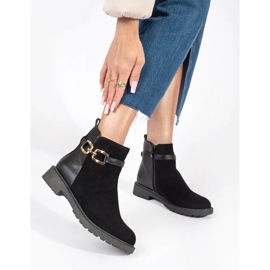 Bottines noires pour femme avec boucle décorative 1