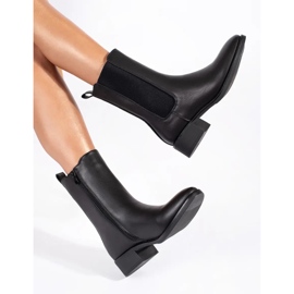 Bottines Chelsea femme noires à talons bas 1