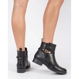 Bottines femme noires à petit talon et bride décorative le noir 2
