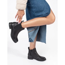 Bottines Chelsea plates femme noires 1