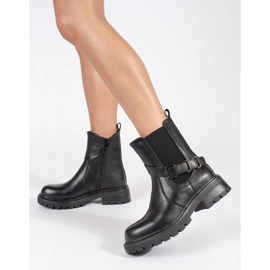 Bottines Chelsea en cuir noir pour femme sur la plateforme Sergio Leone 1
