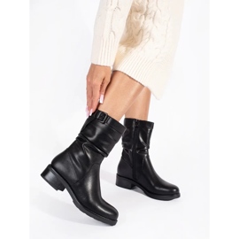 Sergio Leone Bottines femme isolées en cuir noir 1