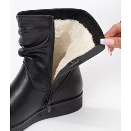Bottines pour femmes en cuir noir sur une semelle basse avec une tige à volants par Sergio Leone le noir 2