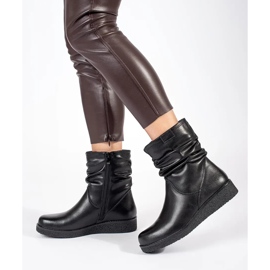 Bottines pour femmes en cuir noir sur une semelle basse avec une tige à volants par Sergio Leone le noir 4