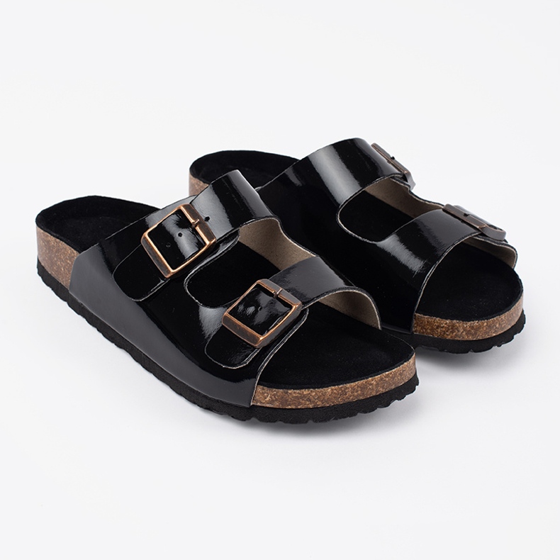 Goodin Les tongs noirs sur une semelle plate 1