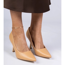 Pompes classiques brunes sur un talon haut de gamme 1