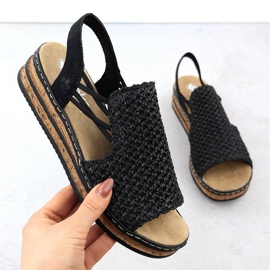 Sandales féminines sur Wedgets Black Rieker 62941-00 le noir 1