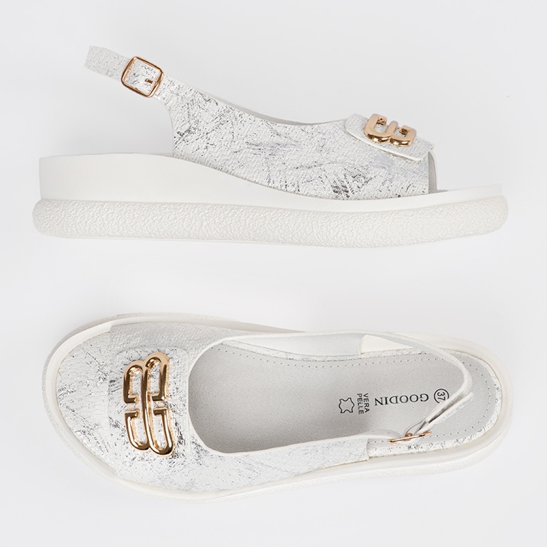 Goodin Sandales plates blanches avec un ornement 2