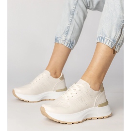 Sneakers sportifs beige avec une insertion d'or 1 Sneakers sportifs beige avec une insertion d'or 1