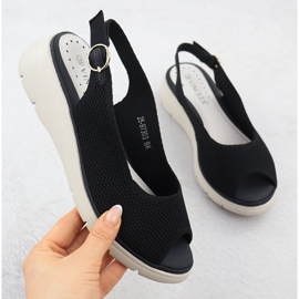 Sandales féminines sur des coins noirs Vinceza 97303 le noir 1