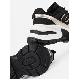 Baskets pour femmes noires avec inserts dorés 1