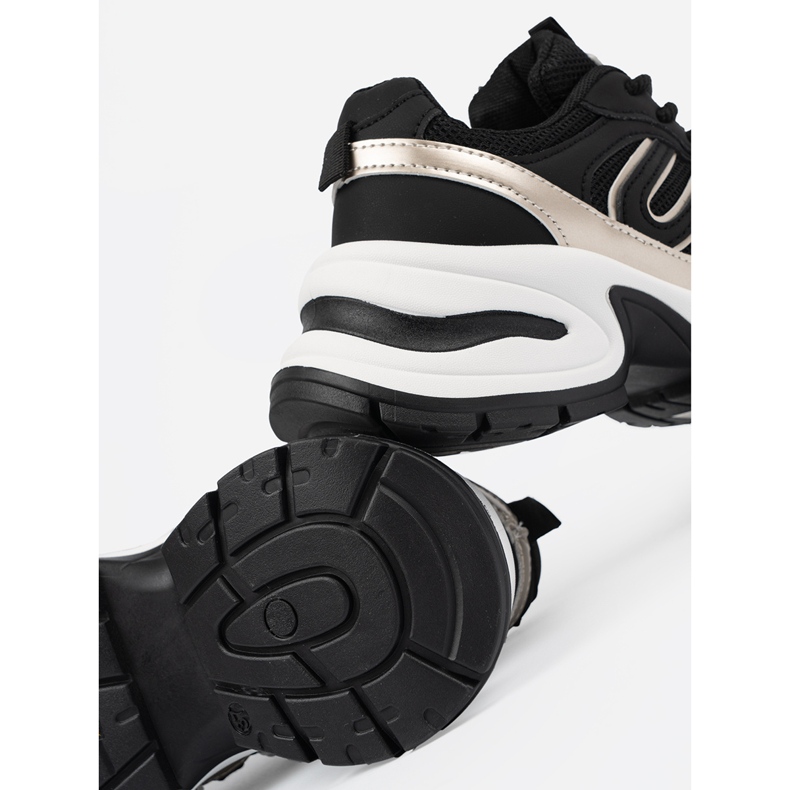 Baskets pour femmes noires avec inserts dorés 1