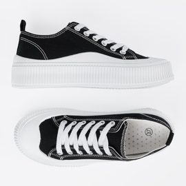 Baskets noires et blanches à semelle épaisse le noir 4