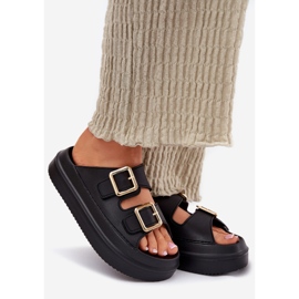 Inna Les tongs pour femmes sur la plate-forme avec des pinces dorées noires le noir 1