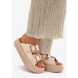 Inna Les tongs pour femmes sur la plate-forme avec des boucles dorées beige 1