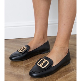 Mocassins de femmes noires avec une décoration dorée 1