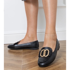 Mocassins de femmes noires avec une décoration dorée 2