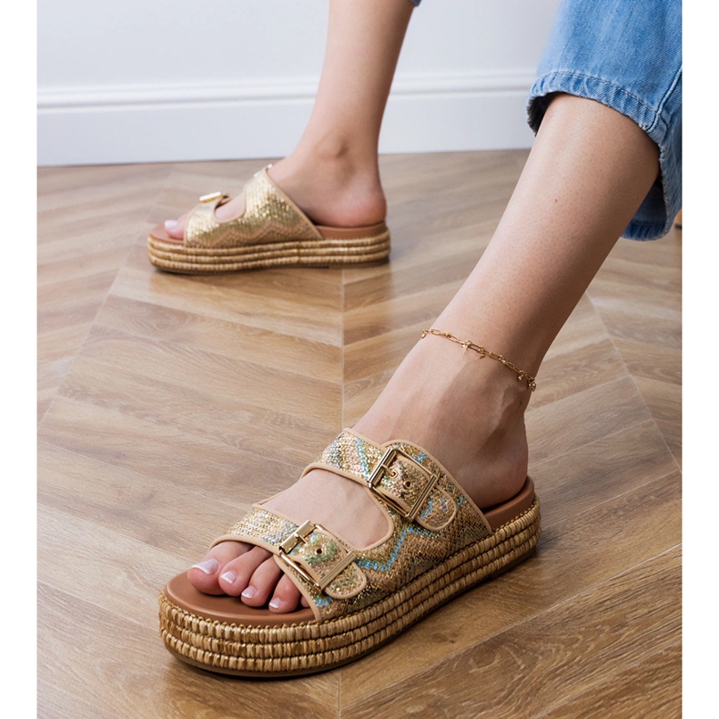 Les tongs dorés avec des pinces sur les rayures d'or 1