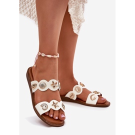 Les tongs des femmes avec des épingles dorées blanches 1 Les tongs des femmes avec des épingles dorées blanches 1