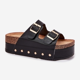 Les tongs pour femmes avec des boucles sur une plate-forme massive noire le noir 1
