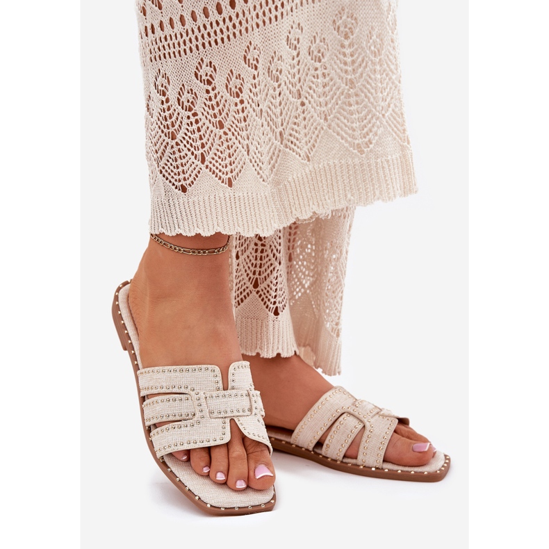 Les tongs plats à plat décorés beige 1