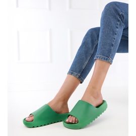 Les tongs en caoutchouc des femmes vertes 3