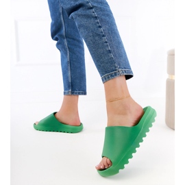 Les tongs en caoutchouc des femmes vertes 4