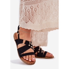 Sandales féminines à thèmes plates avec des goujons dorés noirs 1