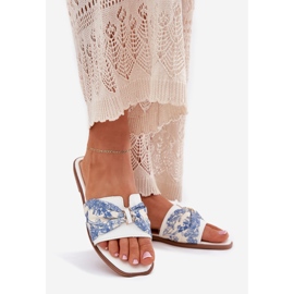 Les tongs des femmes à thèmes plates avec un arc blanc 1