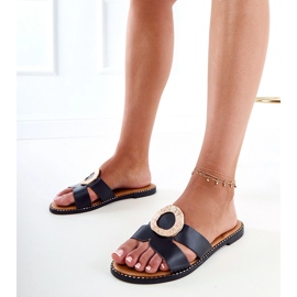 Les tongs noirs avec une décoration dorée et des découpes sur la ceinture le noir 2 Les tongs noirs avec une décoration dorée et des découpes sur la ceinture le noir 2