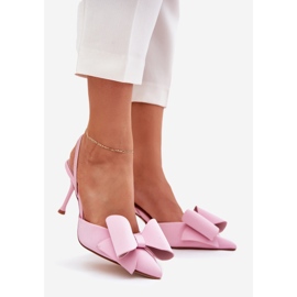 Talons hauts avec des talons nus et un arc rose 1