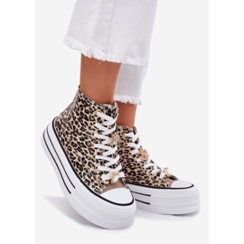 Sneakers pour femmes sur une plate-forme massive avec épingles léopard léopard d'or 1