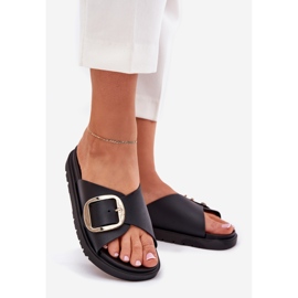 Les tongs pour femmes sur la plate-forme avec une pince dorée noire 1