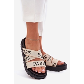 Les tongs pour femmes avec des rayures matérielles parisiennes sur la plate-forme beige 1