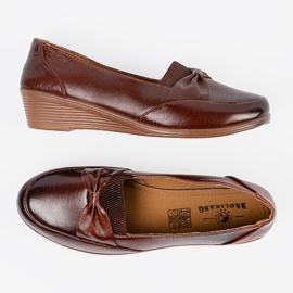 Chaussures basse brunes avec un arc 1