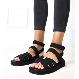 Sandales noires fixées avec une Maimuna à la cheville le noir 1
