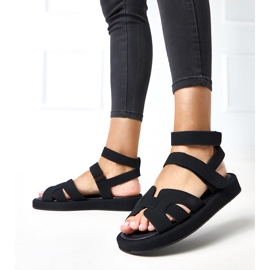Sandales noires fixées avec une Maimuna à la cheville le noir 3