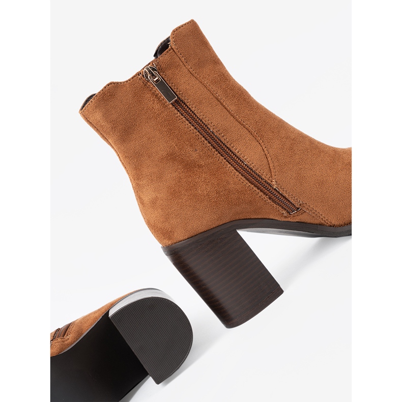 Shelvt Bottes de caramel sur le poste de daim écologique 1