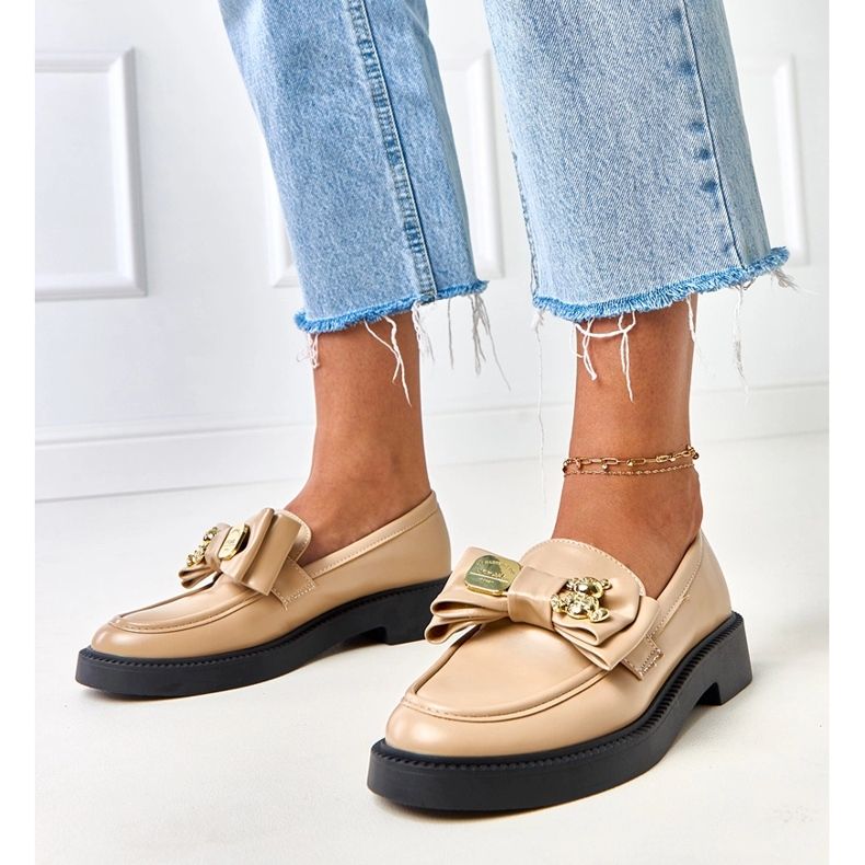 Mocassins beige avec un arc et un ours de teriwa 1