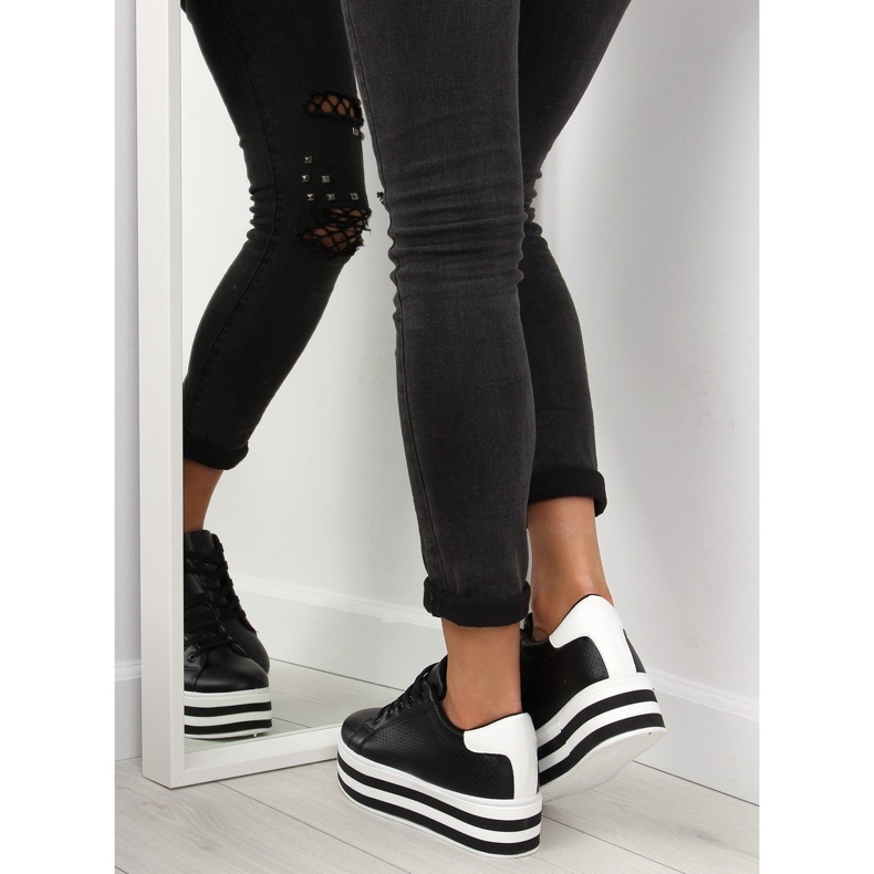 Baskets noires noires à semelle haute le noir 1