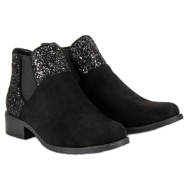 Bottines en daim à talon plat le noir 5