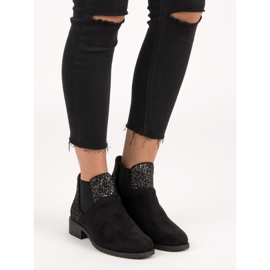 Bottines en daim à talon plat le noir 6