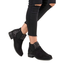 Bottines en daim à talon plat le noir 1