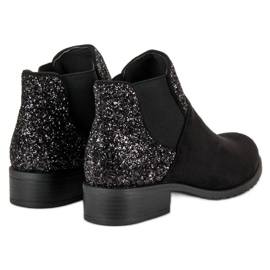 Bottines en daim à talon plat le noir 4